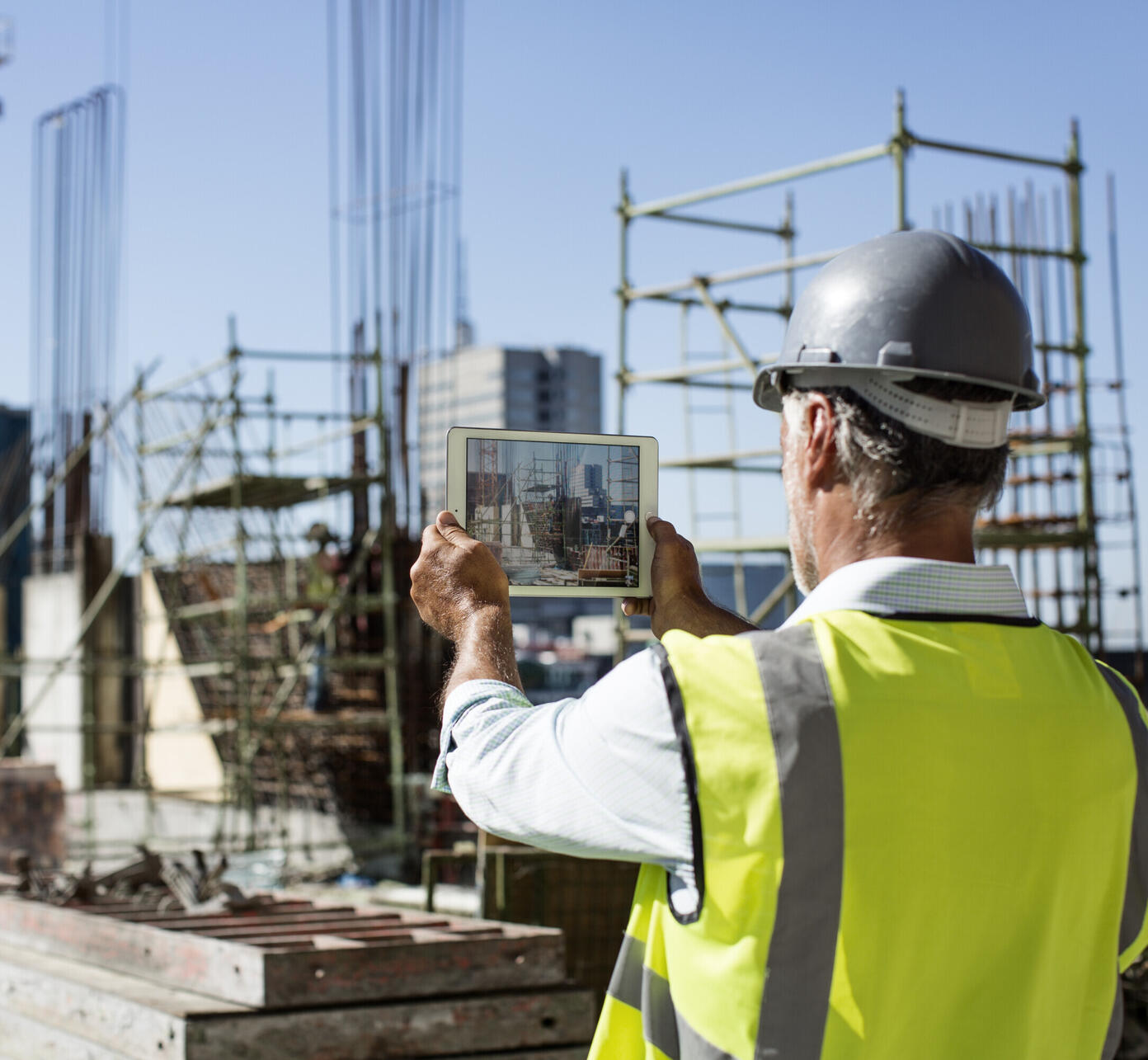 Male architect photographing construction site 552721763 5125x3417